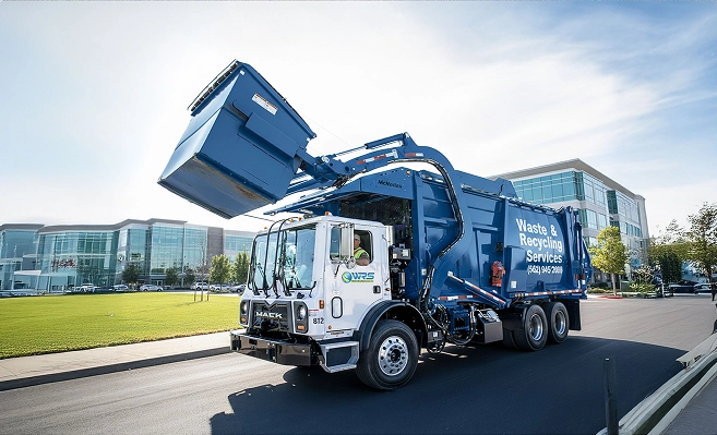 WRS commercial waste collection truck servicing a business